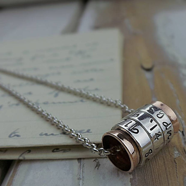 Silver and Copper Spinning Ring Pendant