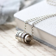 Silver and Copper Spinning Ring Pendant