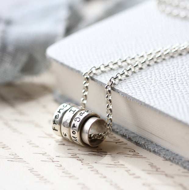 Silver and Copper Spinning Ring Pendant