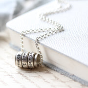 Silver and Copper Spinning Ring Pendant